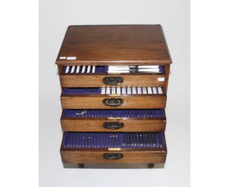 A MATCHED CANTEEN OF SILVER PLATED CUTLERY, including twelve mother 'o' pearl handled fruit knives and forks, twelve silver p