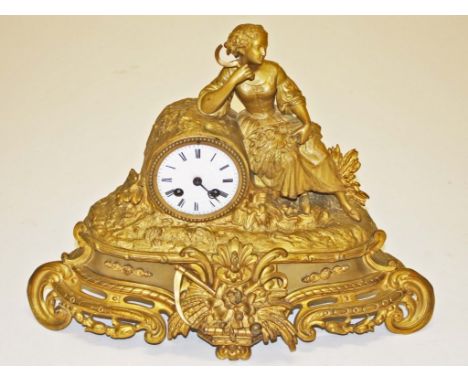 A FRENCH GILT BRASS FIGURAL MANTEL CLOCK, the movement with an outside count wheel, striking on a steel bell, the enamel dial