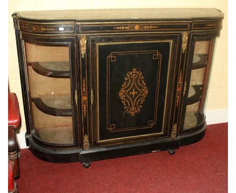 A VICTORIAN EBONISED AND BRASS-MOUNTED CREDENZA, of breakfront outline, with central inlaid cupboard door, enclosing a velvet