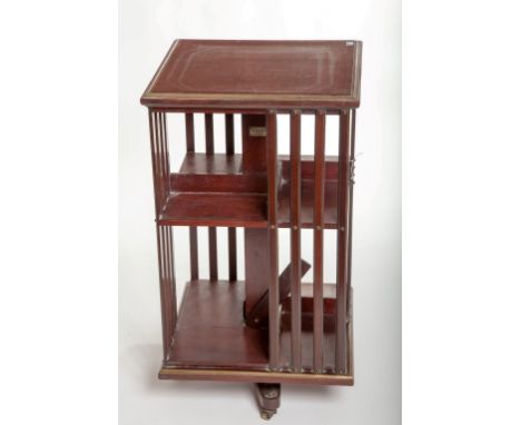 A LATE NINETEENTH CENTURY FRENCH REVOLVING LIBRARY BOOKCASE, by E.M. Terquem who worked out of 79 Rue Scribe, Paris, the squa