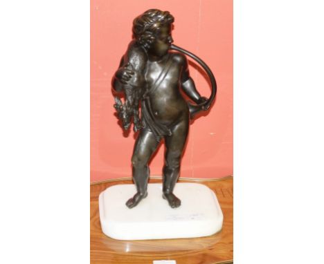 A PAIR OF BRONZE FIGURES, one with a cherub holding a bugle, and a deer thrown across his shoulder, on rectangular white marb