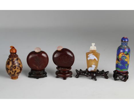 Including a miniature white overlay glass bottle, a miniature snuff bottle, a cylindrical form cloisonne enamel decorated in 