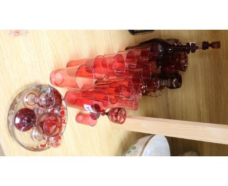 A collection of etched ruby and cranberry glassware