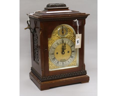 An early 20th century mahogany mantel clock, signed 'Webster, London', of rectangular form with carved pagoda top, the double
