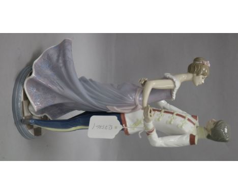 A Lladro figural group, At The Ball, no. 5398, 35cm.