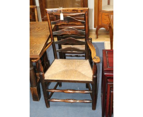 Five ladder back chairs and a carver