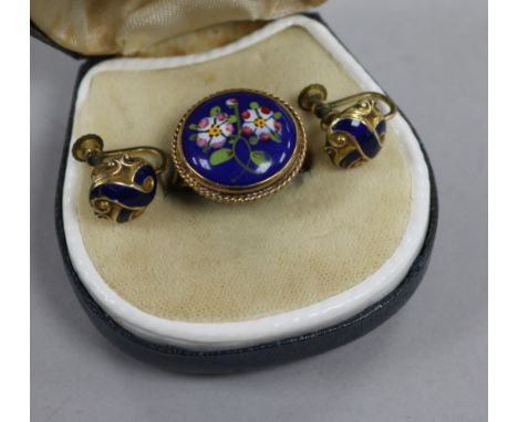 A 9ct gold and enamel floral ring and a pair of blue enamel rolled gold earclips.