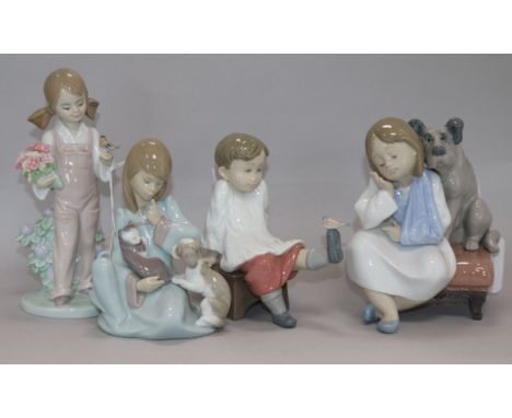 Four Lladro figures, boxed, to include Cat Nap, no. 5640, Spring, no. 5217, Talk to Me, no. 8168 and We Can't Play, no. 5706 
