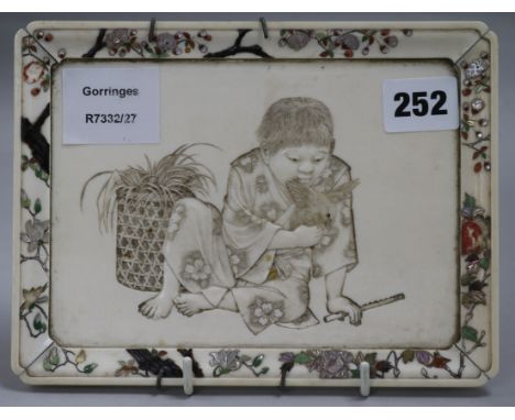 A Japanese ivory and shibayama plaque