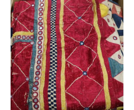 A collection of 19th century Indian silk embroidered and woven textiles