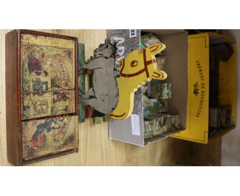 A collection of early playing cards, building blocks and two scratch toys