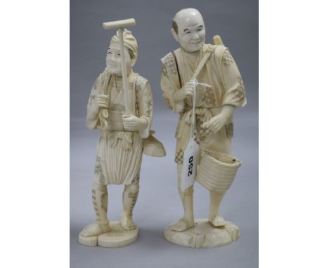 Two Japanese sectional ivory figures of farmers, early 20th century, 25 and 25.5cm