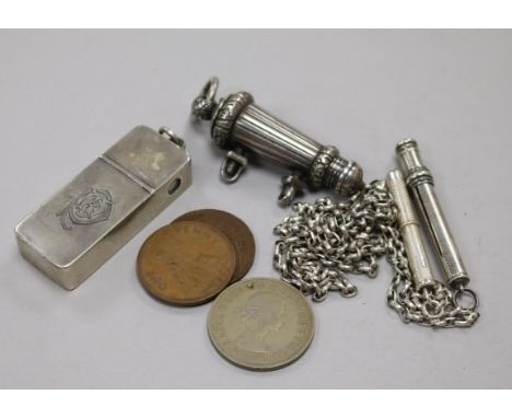 A rifleman's light infantry whistle, vesta, two silver pencils and three coins