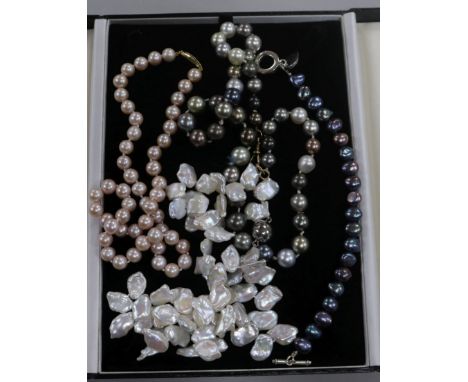 Two cultured pearl necklaces including multi coloured, a cultured pearl bracelet and a baroque pearl necklace.