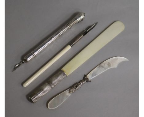 A late Victorian silver mounted Sampson Mordan & Co letter opener, a mother of pearl paperknife and two dip pens