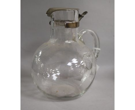 A stylish Edwardian silver mounted glass claret jug, Hukin & Heath, Birmingham, 1907, 17cm.