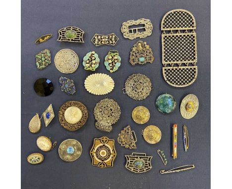 * Costume Jewellery. An Edwardian silver belt buckle, cast in the Rococo style with infants and scolls, two prong bar, 7 cm l
