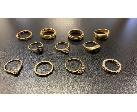 * Rings. A mixed collection of dress rings, mostly 9ct gold including a 9ct gold band set with a small diamond in a star sett