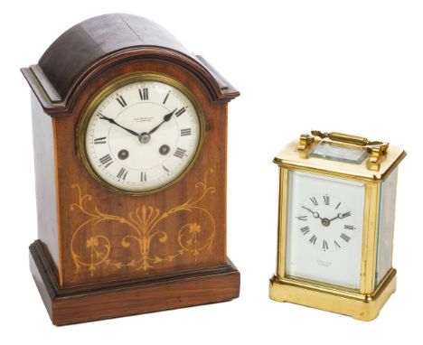 * Carriage Clock. A modern brass carriage clock by Clermont London, the white enamel dial with black roman numerals, the bras