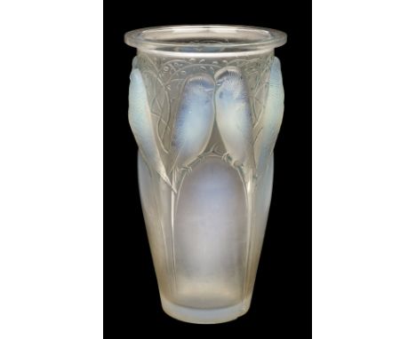 * Lalique (René, 1860-1945). A 'Budgerigar' opalescent glass vase circa 1924, of long slender form with finely moulded detail