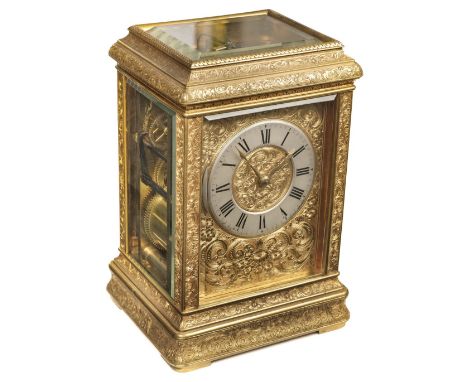 * Carriage Clock. A Victorian brass carriage clock by Elkington &amp; Co, the brass dial with silvered chapter ring, black ro