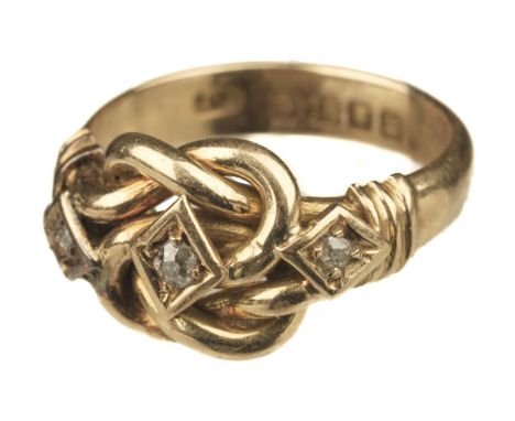 * Ring. An 18ct gold knot ring, set with 3 small diamonds, stamped '18', size M/N, gross weight 6.5gQTY: (1)