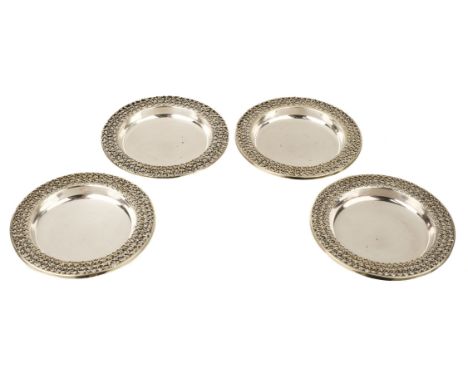 * Stuart Devlin. Four silver dishes by Stuart Devlin, London 1972, silver gilt pierced border and base, surface scratches to 