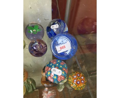 A collection of 6 paperweights, 4 Caithness and 2 Millefiori 