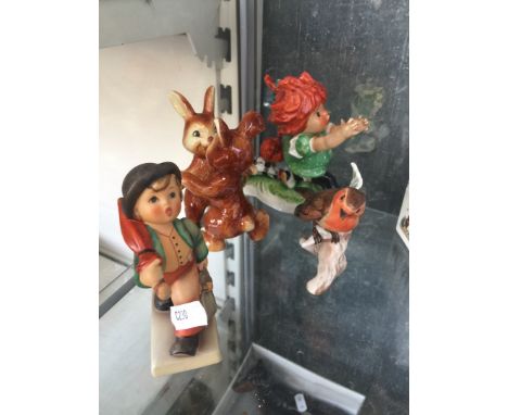 Four Goebel or Hummel figures 