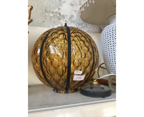A round glass ceiling light 