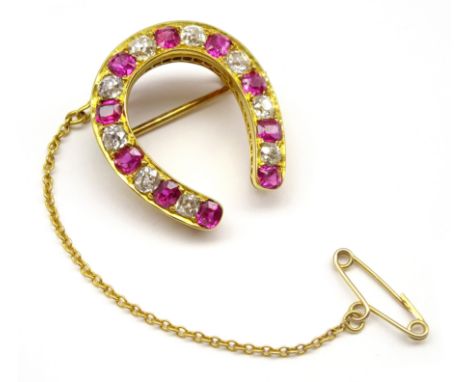 Early 20th century gold ruby and old cut diamond horseshoe brooch Condition Report &amp; Further Details Approx 6.4gm, size 2