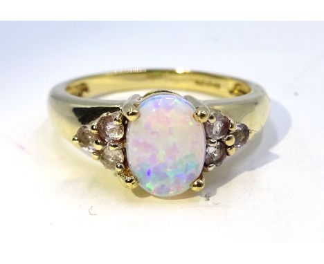 9ct gold opal and white topaz ring, hallmarked Condition Report & Further Details Approx 2.7gm, size M-NClick here for furthe