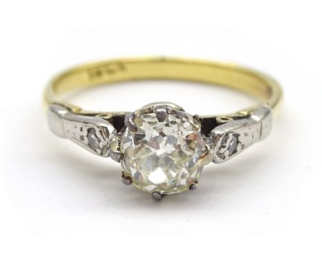 Gold old cut diamond ring, the central diamond of approx 0.40 carat, set with two diamonds either side, stamped 18ct Conditio