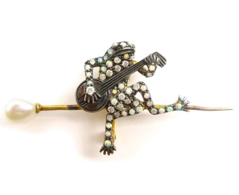 Diamond, pearl and opal brooch of a frog playing a banjo Condition Report & Further Details length = 60mm Click here for furt