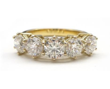 18ct gold five stone round brilliant cut diamond ring hallmarked, total diamond weight 2.57 carat Condition Report & Further 