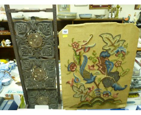 Carved and inlaid three tier folding cakestand and a woolwork embroidered firescreen