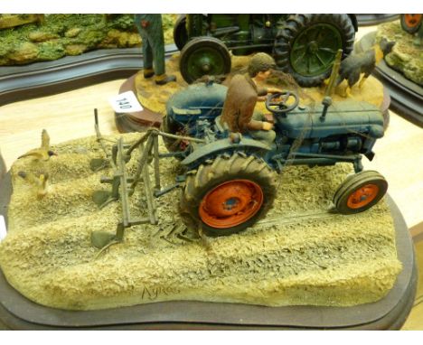 Country Artists model of a farmer in a blue tractor ploughing a field, sculptor Ayres
