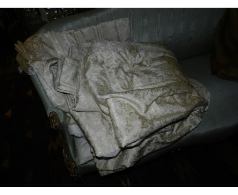 Four cream ground silk and inter-lined curtains, having stitched design of scrolling foliage. Approx: L.240cm, W.174