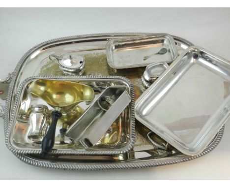 A quantity of silver plate, including a large tray, sauce ladle, cruet and entree dishes, (qty).