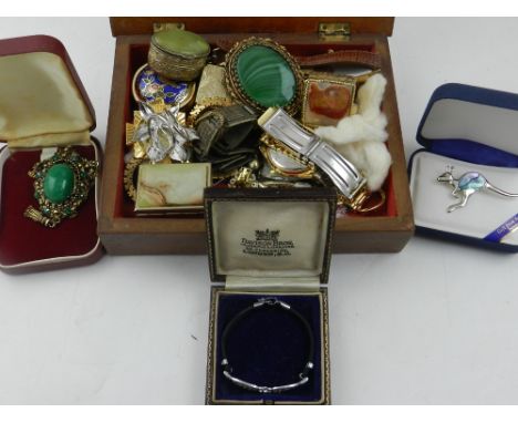 A quantity of costume jewellery to include a white metal and enamelled floral ring, white metal trinket boxes, a Hollywood br