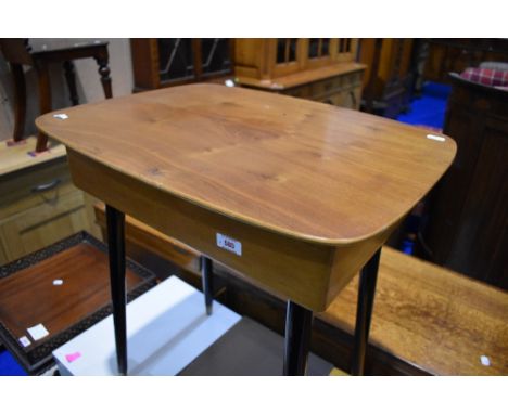 A vintage cutlery canteen on dansette style legs