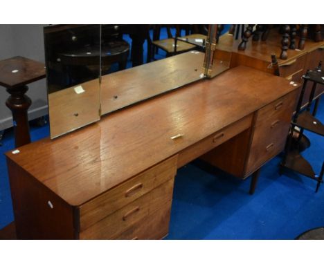 A vintage teak dressing table, width approx 112cm