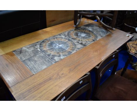 A vintage teak and tile dining table , approx 161 x 91cm, plus 2 50cm extensions to ends