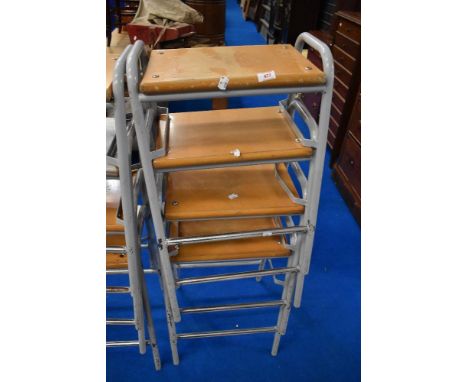 A set of four vintage school or similar lab or workshop stools