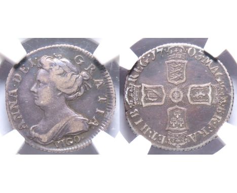 Anne 1703 VIGO Sixpence. Draped bust left, VIGO below. R. Crowned cruciform shields, English shield dividing date. Ref: S.359