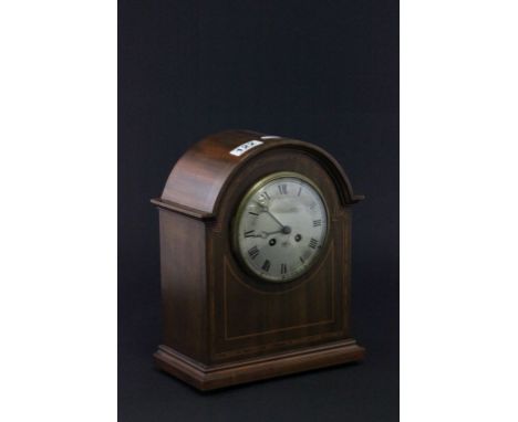 A mahogany cased clock with silvered dial 