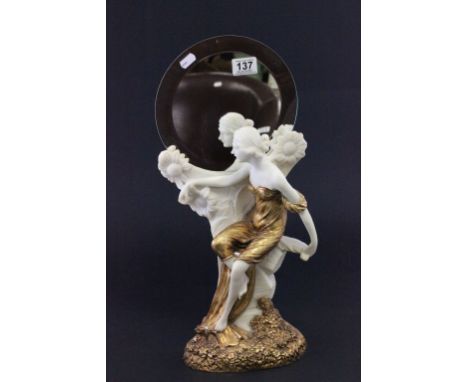 A Art Deco style mirror with stylised lady 