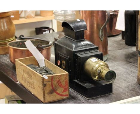 A magic lantern, along with various slides