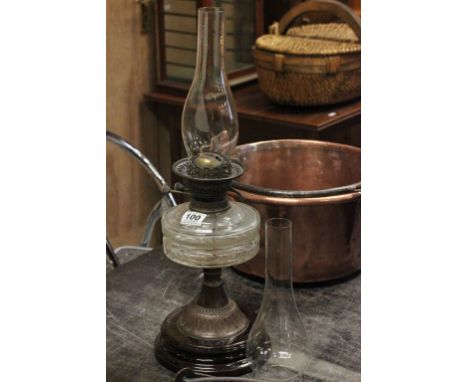An Edwardian glass oil lamp 