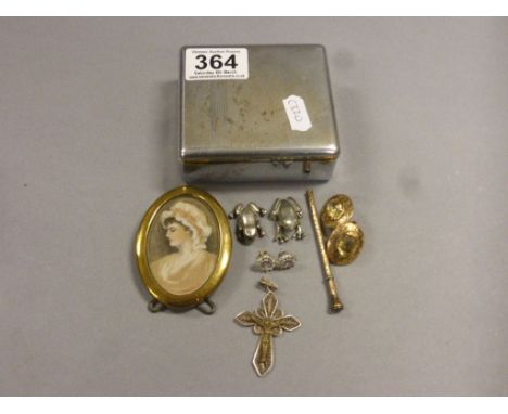 A miniature model of frog marked "Sterling", along with portrait of lady in a oval frames and other items 